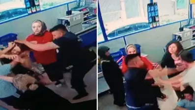 Markette dehşet anları: Kadını saçlarından tutup yerde yumrukladı