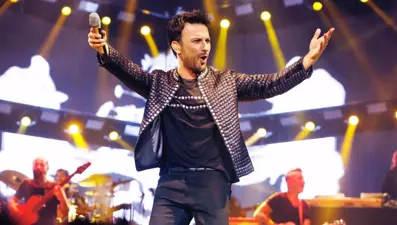 Tarkan'dan İzmir konseri öncesi fotoğraflı mesaj
