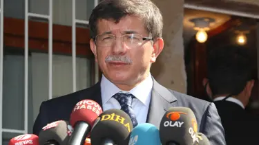 Davutoğlu'ndan Sarkozy'ye: Aynaya bak