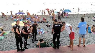 Plajda içki içen iki kadına ceza