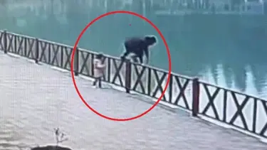 Poz verirken göle düşen çocuğu babası kurtardı