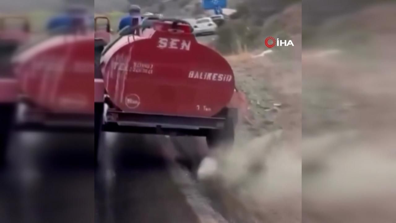 Patlak lastik, yangına su taşıyan çiftçiyi durduramadı