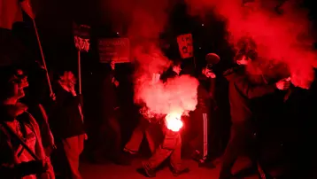Milano'da olimpiyat protestosu: "Düşmanını tanı"
