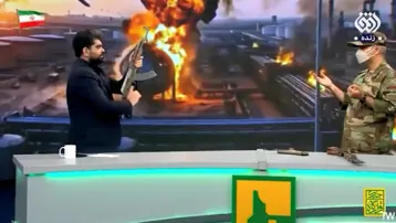 İranlı sunucu canlı yayında Kalaşnikov ile ateş etti