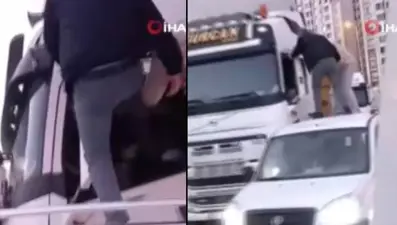 TIR şoförünü arabanın üzerine çıkıp dövdüler