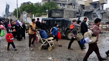 Musul'da halk çapraz ateşten kaçıyor