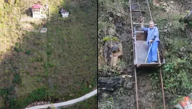 Yolu olmayan evine ulaşmak için raylı sistem kurdu