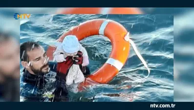 Denizde kaybolan iki aylık bebeği yakalamayı başardı