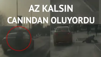 Trafikte patenle kayarken arabanın önüne düştü