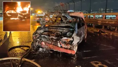 Bayrampaşa'da yayaya çarpmamak için bariyerlere vuran araç yandı