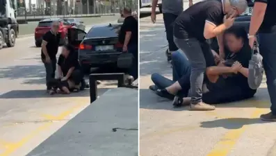 Bursa'da cadde ortasında dayak: Eski kocasını tekme tokat dövdü