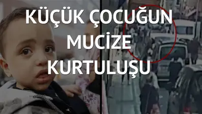 Balkondan düşen çocuğu esnaf havada yakaladı