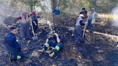 Kuru otlarla kaplı arazide korkutan yangın