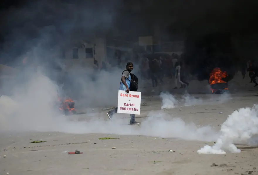 Haiti'de hükümet karşıtı protestolar şiddet olaylarına sahne oluyor 1