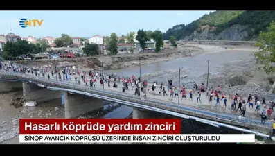 Hasarlı köprüde yardım zinciri