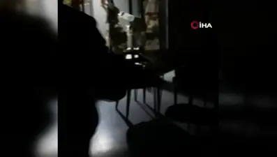 Polis baskınında 'şalterli kaçış' (O anlar kamerada)