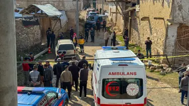 Yaşlı adam komşularını katletti