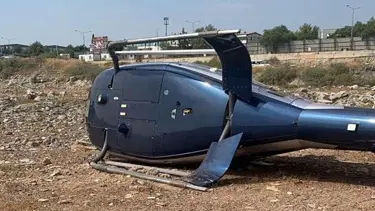 İzmir'de arızalanan helikopter iniş sırasında yan yattı