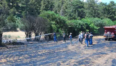 Çanakkale'de tarım arazisinde çıkan yangın söndürüldü