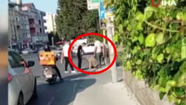 Eşini takip eden adamı sokak ortasında tekme tokat dövdü