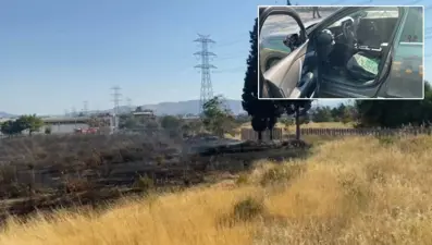 İzmir’de otluk alanda çıkan yangın AVM otoparkına sıçradı