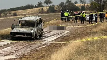 Dağlık alanda yanmış aracın yanında başsız erkek cesedi bulundu