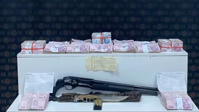 Tefecilik operasyonunda yatağın altından poşetler dolusu para çıktı