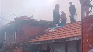 Kütahya'da iki katlı evde yangın