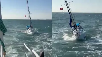 Arıza yapan yelkenlinin yardımına balıkçı teknesi yetişti