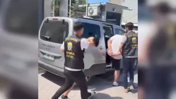 Tehdit ettikleri marketi kurşunladılar. 2 tutuklama
