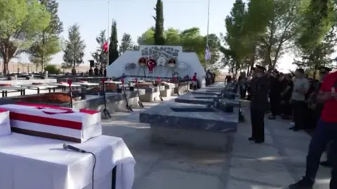 KKTC'de 52 yıl sonra şehit töreni: 37 şehitten 15’inin kimlik tespit