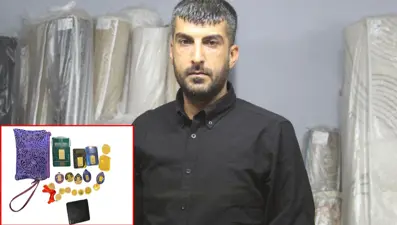 Halıdan 650 bin liralık altın çıktı