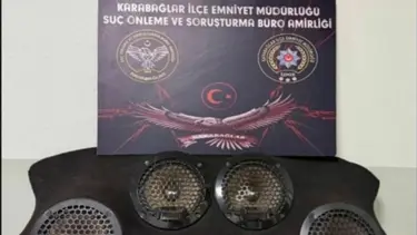 Otomobilin camını kırıp teyp ve ses sistemi çalan 2 şüpheli yakalandı
