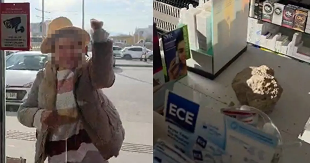 Fark ücreti vermek istemeyen kadın eczaneye taşla saldırdı