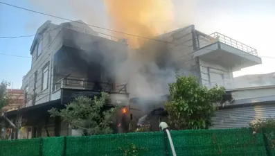 Ayvalık'ta korkutan yangın: Garajdaki araçta başladı, eve sıçradı