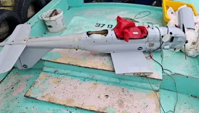 Denizde avlanan balıkçılar, İHA buldu