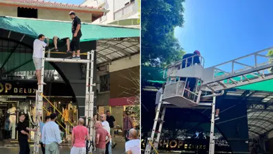 Evinin balkonunda dengesini kaybeden kişi iş yerinin tentesine düştü