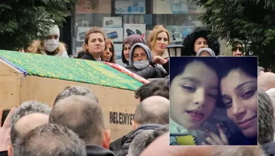 Spor salonunda fenalaşıp ölen hemşirenin cenazesi oğlunun yanına defnedildi