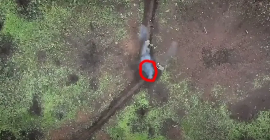 Rus askeri Ukrayna İHA'sından atılan bombaları eliyle etkisiz hale getirdi 8