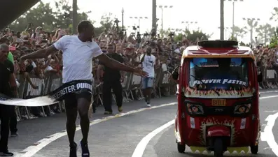 Usain Bolt triportöre de fark attı