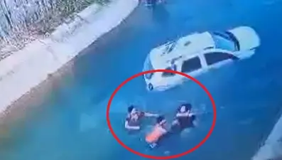 Sulama kanalına uçan cipteki 2 kişiyi çevredekiler kurtardı