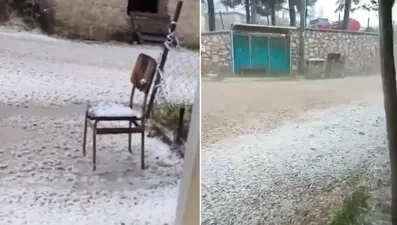 Dakikalar içinde ilçe beyaza büründü. Ceviz büyüklüğündeki dolu camları kıracaktı