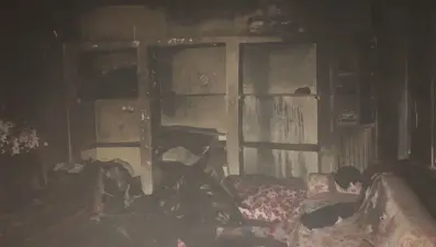 Evini yakan oğlundan kaçarak komşusuna sığınan kadın yaşamını yitirdi