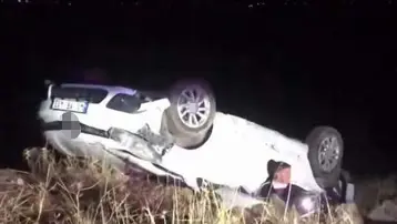 Şarampole yuvarlanan araç takla attı